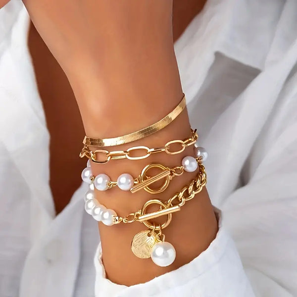 Conjunto de pulseras elegantes en oro de 4 piezas – Serpiente, perlas y eslabones