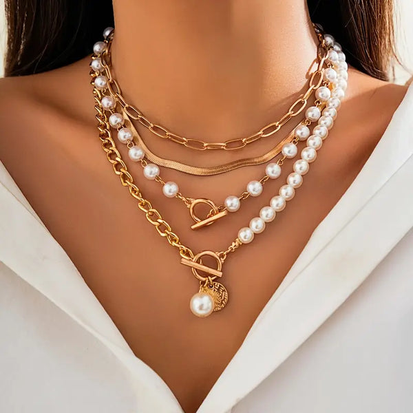 Conjunto de collares vintage de perlas y cadena de serpiente en oro