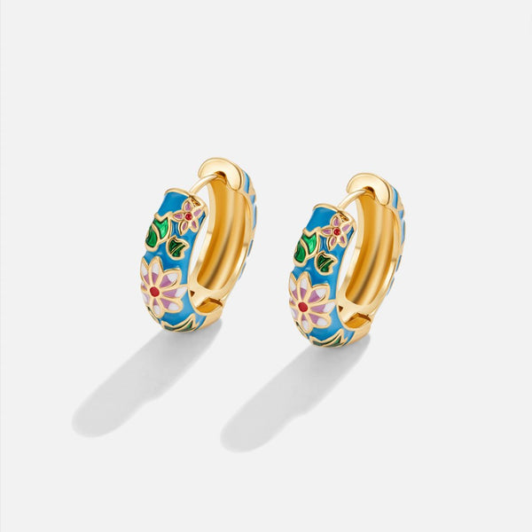 Pendientes de aro dorado con flor