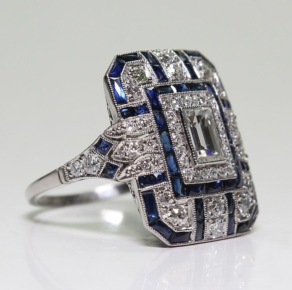 Anillo vintage de plata pulida y zirconia azul